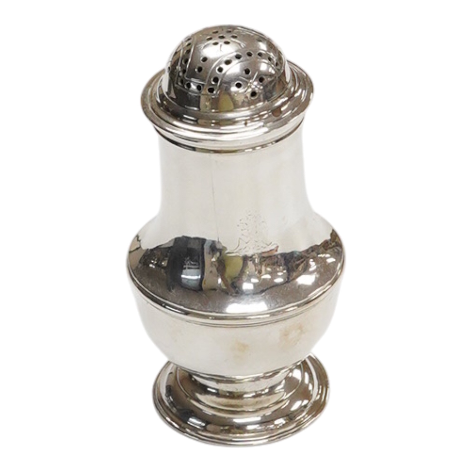 An early George II silver baluster pepperette, maker T?, London, 1734, with engraved crests, height 91mm, 82 grams.